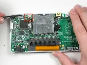Desconectar la placa lógica de la Nintendo DS Lite