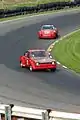 Ford Escort y Porsche 911 en el U.S. Vintage Grand Prix de 2004