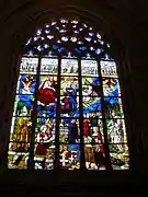 Vitral con La Asunción y la Coronación de la Virgen con Filiberto y Margarita.