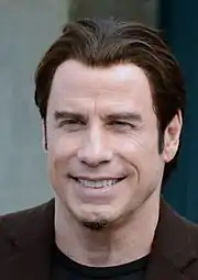 John Travolta interpreta al general de brigada Quintard.