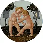 Reverso. Dos niños participan en una lucha libre sin restricciones.