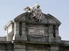 Escudo de Armas soportadas por la Fama