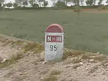 Mojón en la antigua N-III