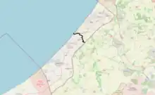 The Gaza Strip with a line running in the middle. North of the line, which is almost half of the total land area of the Strip, is where Israel told people to evacuate from.