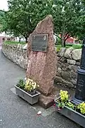 Placa con motivo de la visita del Príncipe de Asturias para la entrega al pueblo ejemplar de Asturias.