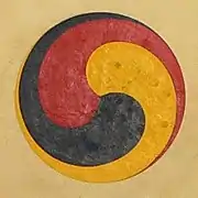 Taegeuk tricolor en un tambor buk