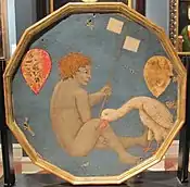 Reverso del último, con dos escudos y un niño con cigüeña (?).