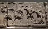 Placa de la Amazonomachy que se cree muestra a Herculeas tomando el pelo de la reina amazona Hippolyta.